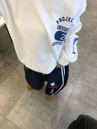 College Arch Logo Sliding Neckline Balloon Fit Sweatshirt
