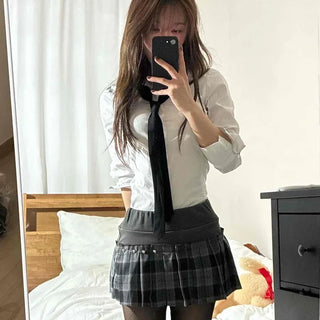Studded belt detail low pleat mini skirt
