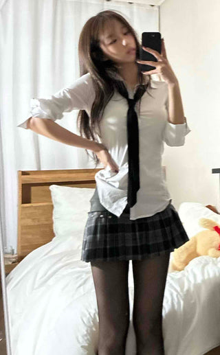 Studded belt detail low pleat mini skirt