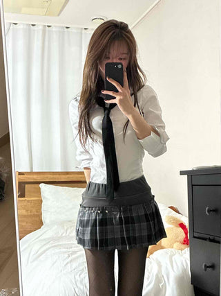 Studded belt detail low pleat mini skirt