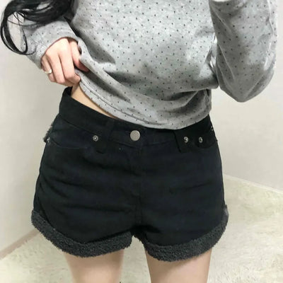 High-waisted denim shorts with hemline frill detail