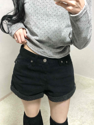High-waisted denim shorts with hemline frill detail