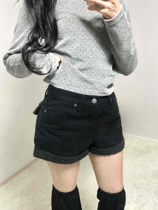 High-waisted denim shorts with hemline frill detail