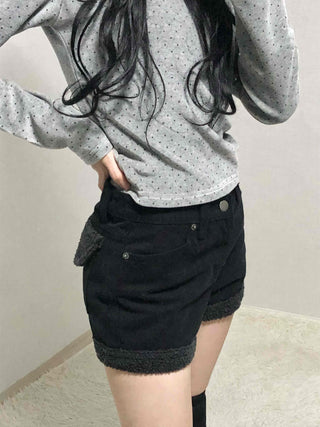 High-waisted denim shorts with hemline frill detail