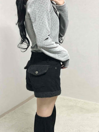 High-waisted denim shorts with hemline frill detail