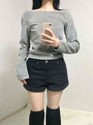 High-waisted denim shorts with hemline frill detail