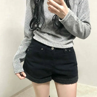 High-waisted denim shorts with hemline frill detail