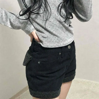 High-waisted denim shorts with hemline frill detail