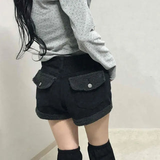 High-waisted denim shorts with hemline frill detail