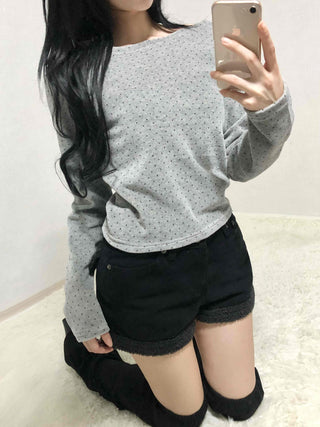 High-waisted denim shorts with hemline frill detail