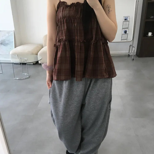 Vert check frill sleeveless blouse