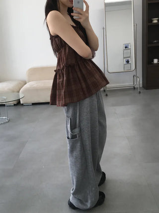 Vert check frill sleeveless blouse