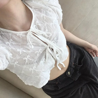 Nev Ribbon See-through Sleeve Puff Blouse