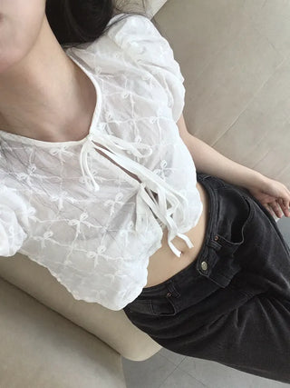 Nev Ribbon See-through Sleeve Puff Blouse