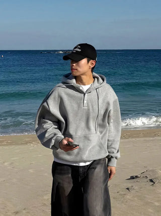 black hooded sweater