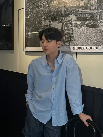 blue draped shirt