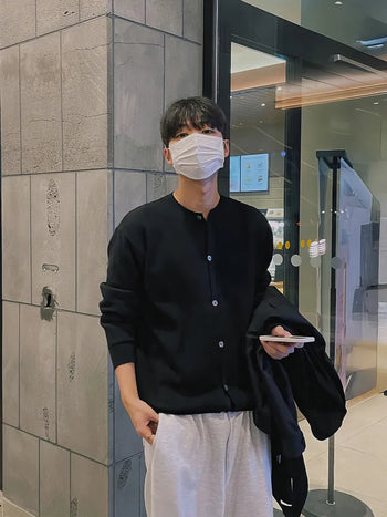 black round sweater