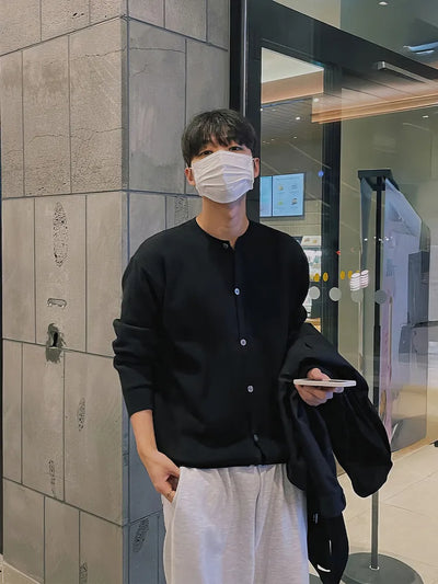 black round sweater