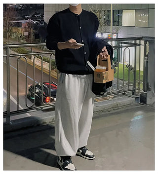 black round sweater