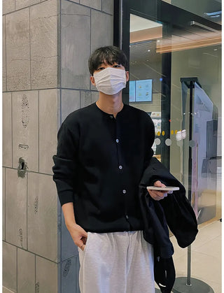 black round sweater