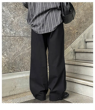 black pleated pants
