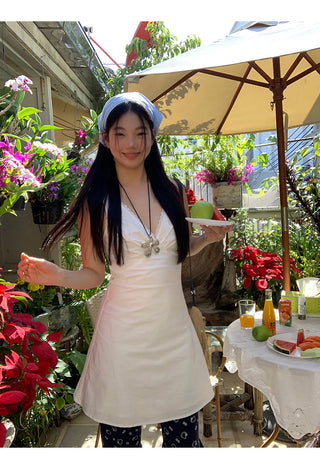 white V-neck dress