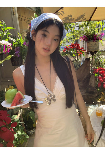 white V-neck dress