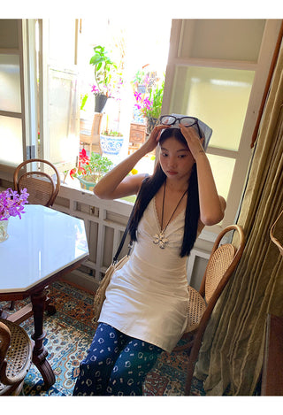 white V-neck dress