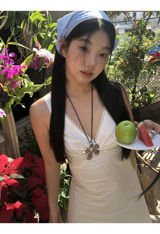white V-neck dress