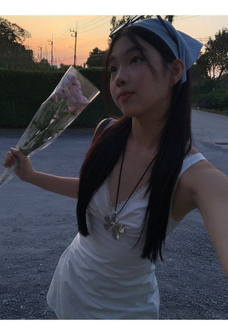 white V-neck dress