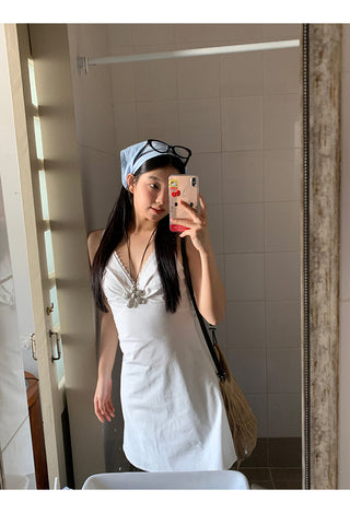 white V-neck dress