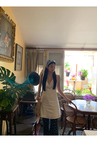 white V-neck dress