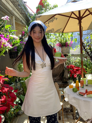 white V-neck dress