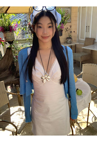 white V-neck dress