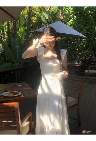 white backless dress