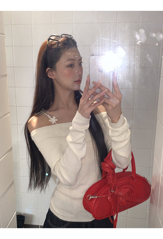 white off-shoulder sweater