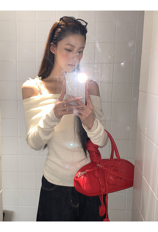 white off-shoulder sweater