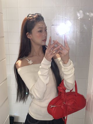 white off-shoulder sweater