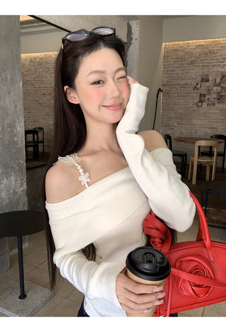 white off-shoulder sweater