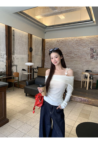 white off-shoulder sweater