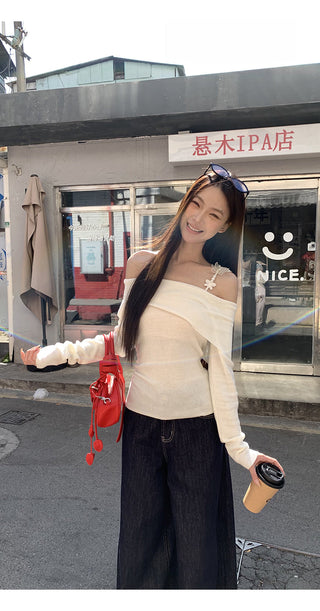 white off-shoulder sweater