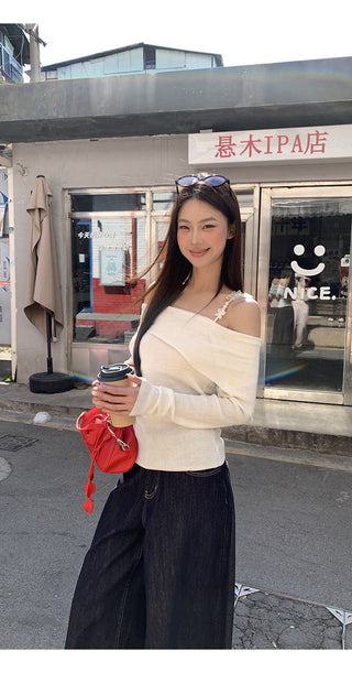 white off-shoulder sweater