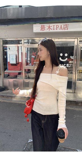 white off-shoulder sweater