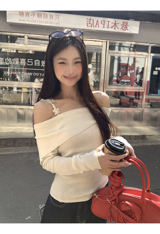 white off-shoulder sweater