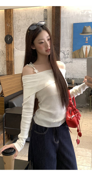 white off-shoulder sweater