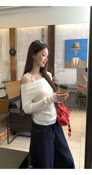 white off-shoulder sweater