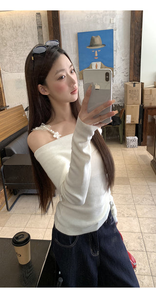 white off-shoulder sweater