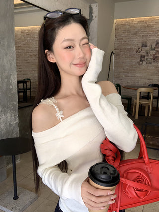 white off-shoulder sweater