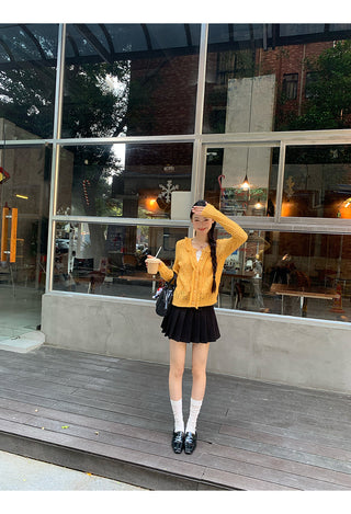 yellow knit cardigan
