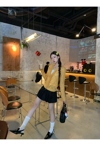 yellow knit cardigan
